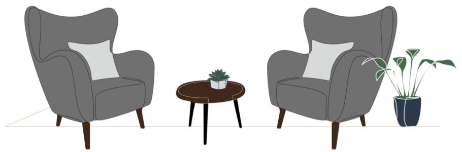 Zwei Coaching-Sessel mit Tisch und Pflanzen